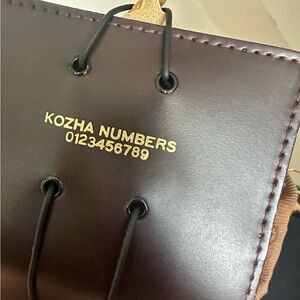 KOZHA NUMBERS DIGIT IN MERLOT